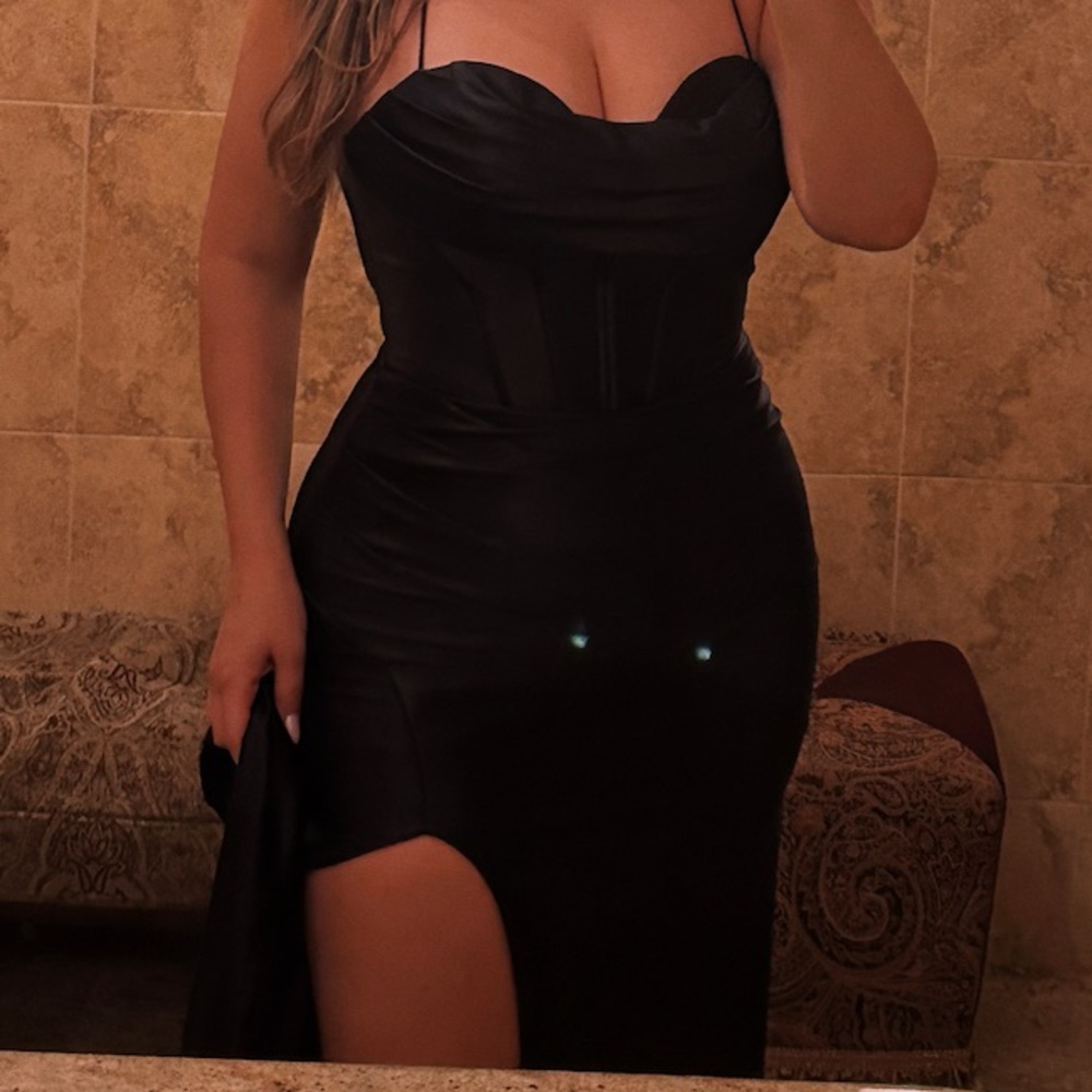 Black Long sleek formal gown with a corset bodice.